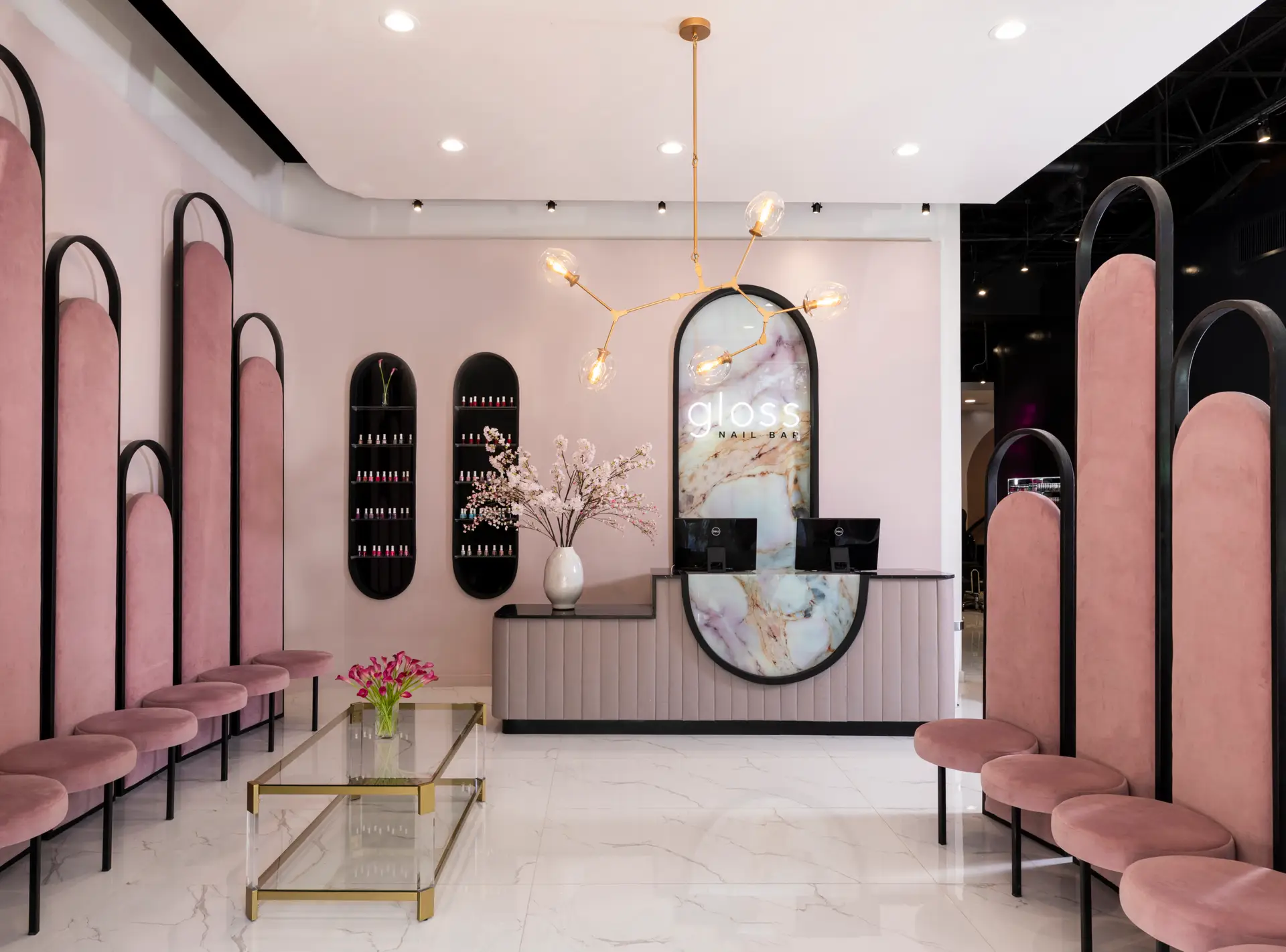 Gloss Nail Bar luxury nail salon Houston lobby with pink velvet chairs