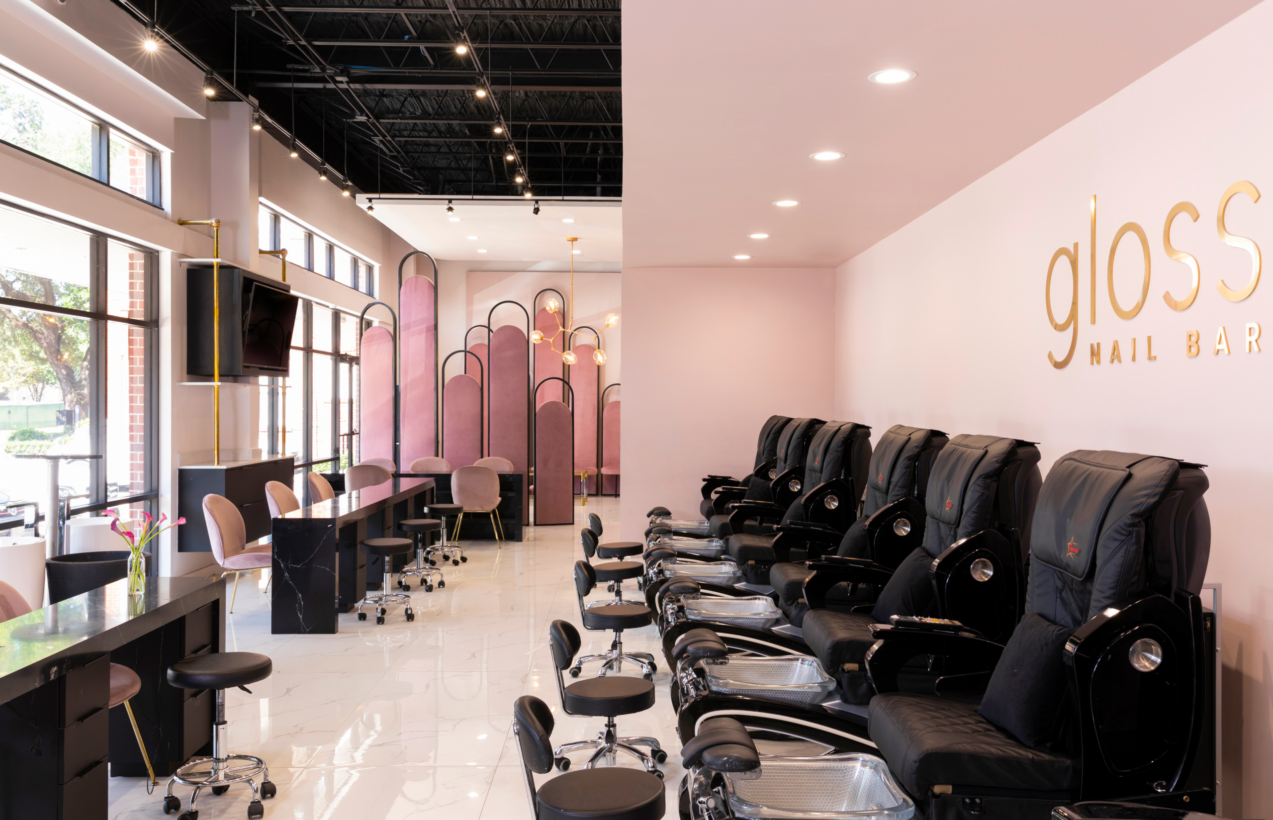 Luxury pedicure spa chairs at Gloss Nail Bar