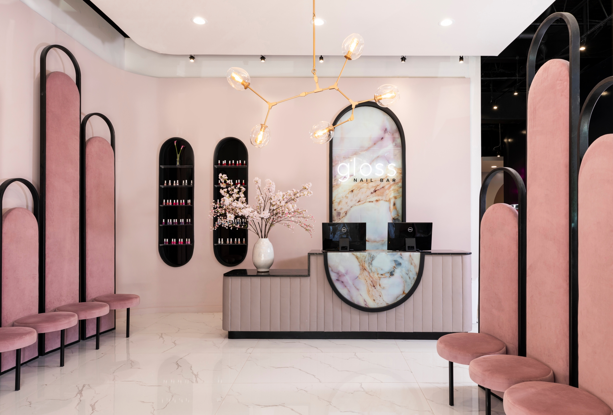 Reception area with cherry blossoms at Gloss Nail Bar Houston